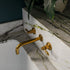 Francone BT84 traditional wall-mounted bathroom faucet with droplet levers, crafted in unlacquered brass.
