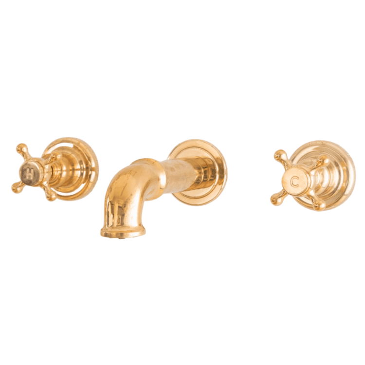 Traditional Francone BT93 wall mounted bathroom faucet in unlacquered brass with double tap handles.