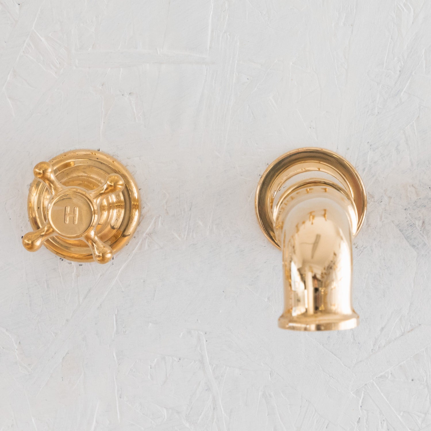 Francone BT93 traditional wall-mounted bathroom faucet with solid brass spout and tap handles.