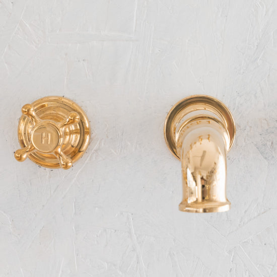 Francone BT93 traditional wall-mounted bathroom faucet with solid brass spout and tap handles.