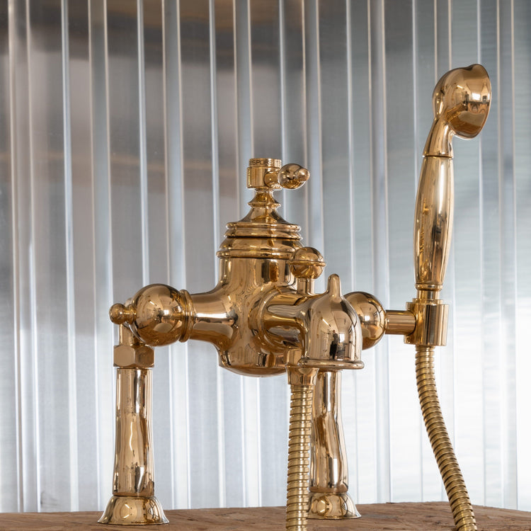 Francone BT95D traditional unlacquered brass deck mounted bath mixer tap and hand shower faucet.