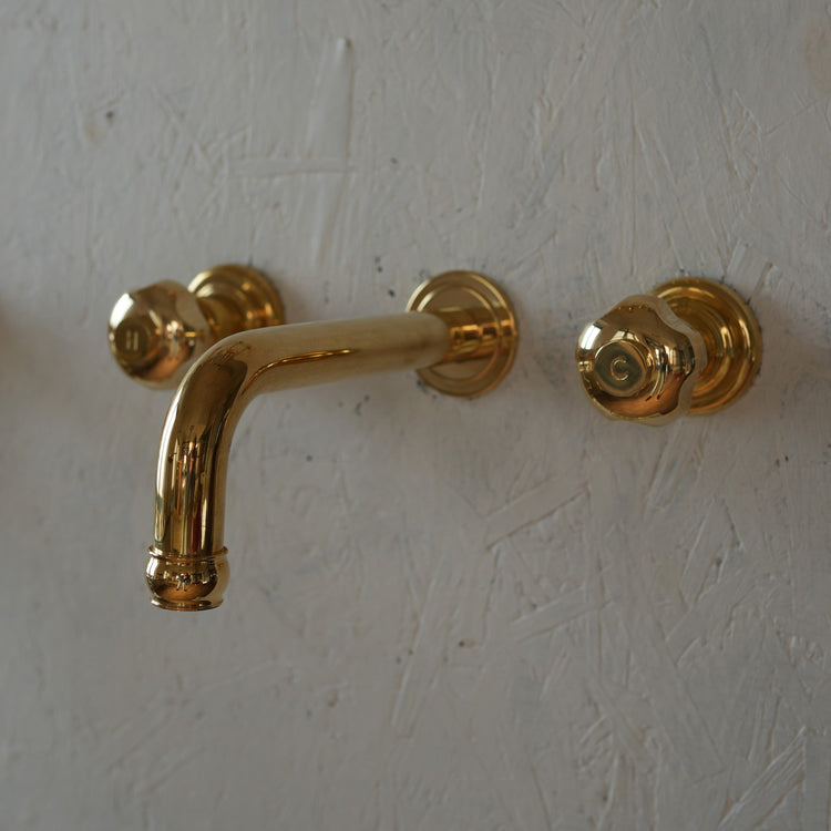 Francone BT96 solid brass three-hole wall-mounted basin faucet with traditional Forma tap handles.