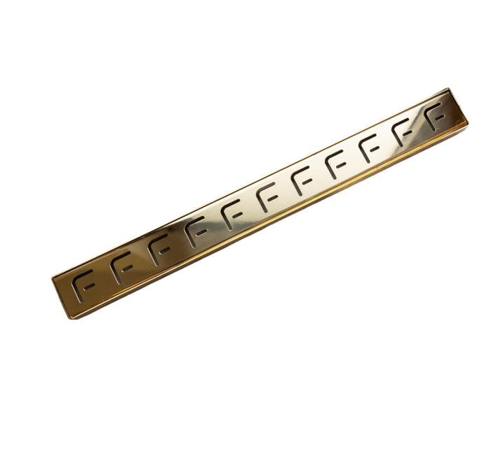 Francone BTA17 linear shower drain with a slotted grate in unlacquered brass.