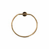 A circular Francone BTA23 solid unlacquered brass towel holder for luxury bathrooms.