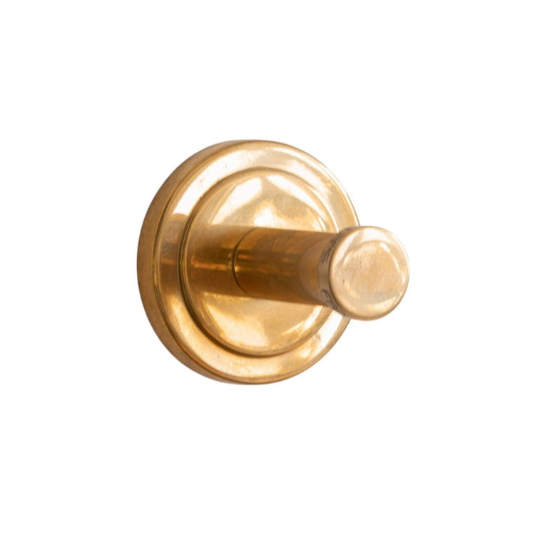 Francone BTA35 round single robe hook in unlacquered brass, a luxury Italian-designed bathroom accessory.