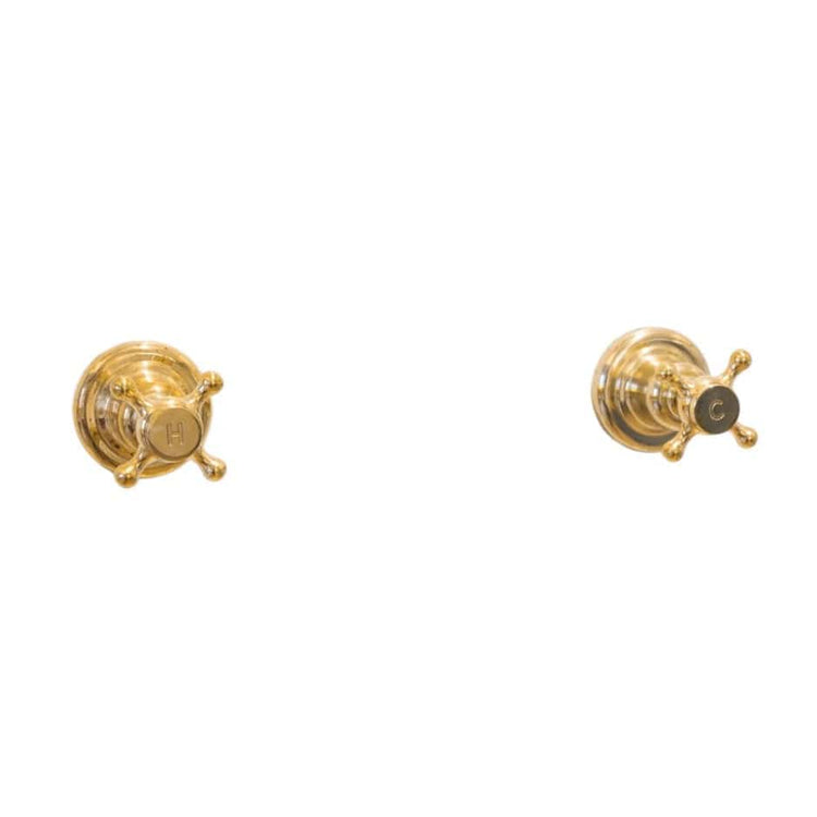 Traditional Francone BTH bespoke faucet tap handles in solid unlacquered brass for a luxury bathroom.