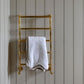 Francone BTR14 traditional plumbed-in solid brass heated towel rail installed in an Italian bathroom.
