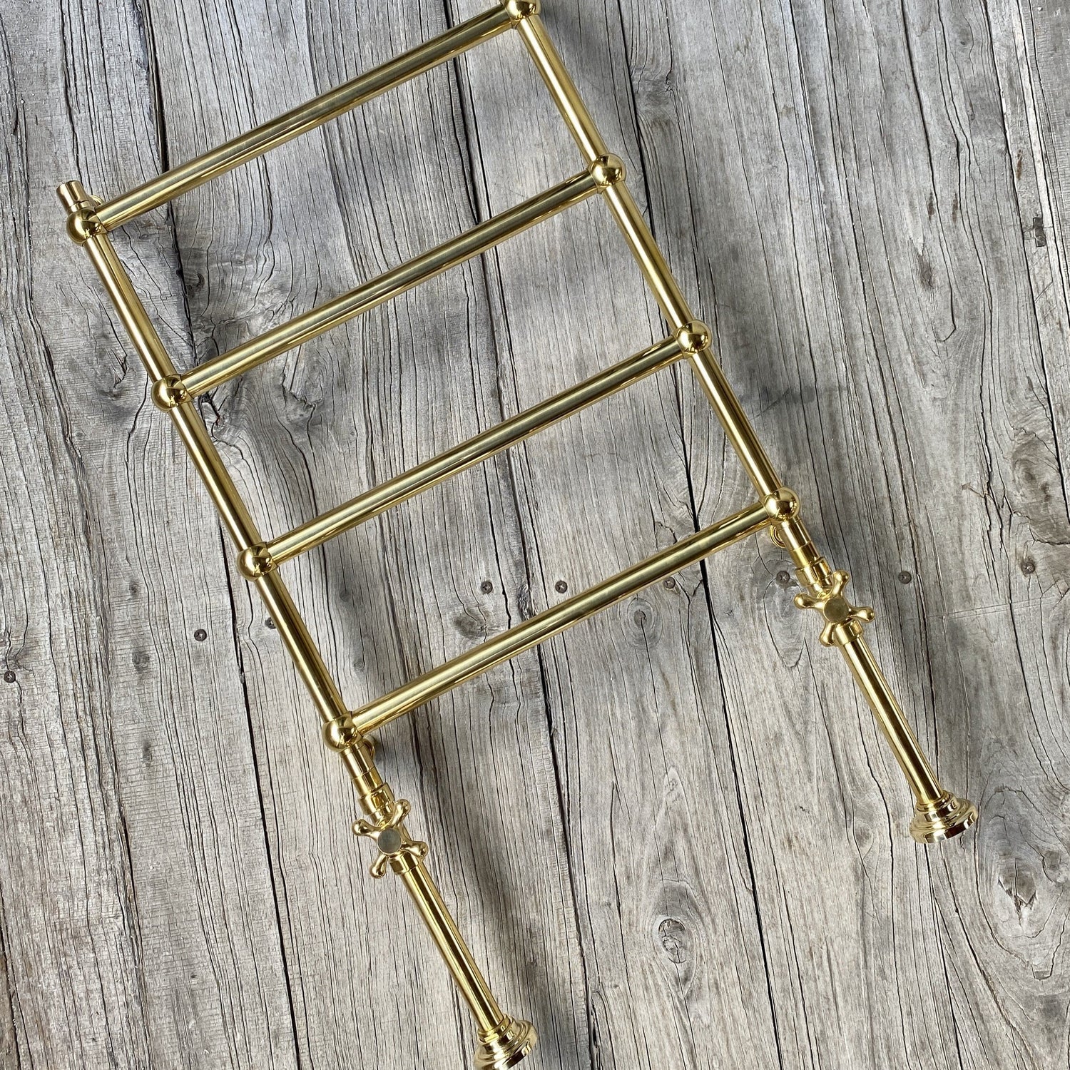 Francone BTR20 traditional unlacquered brass floor-mounted heated towel rail for luxury bathrooms.