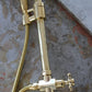 Detail of the traditional vintage Francone BTS13F unlacquered brass floor-mounted column shower.