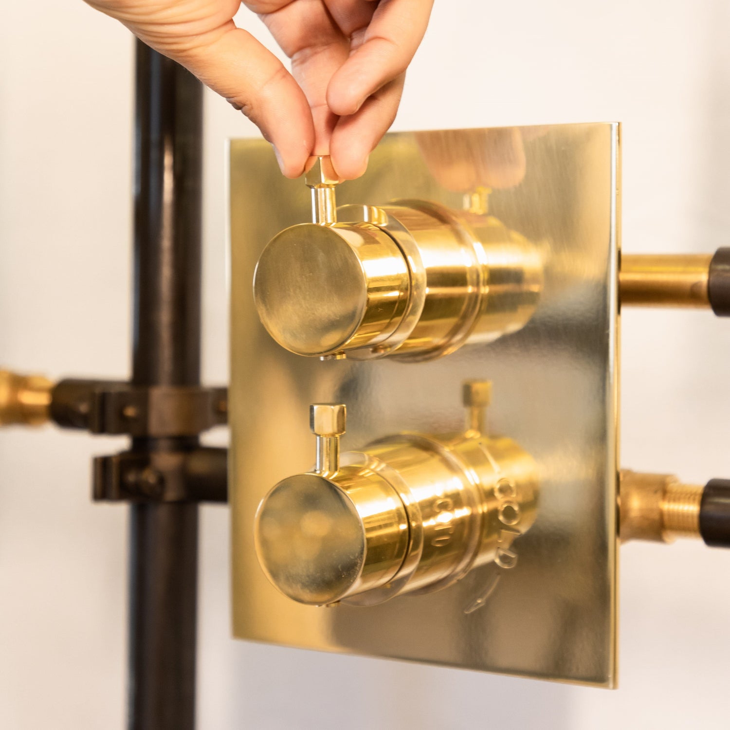 Francone BTS1H solid brass concealed thermostatic shower control with hexagonal pin handles.