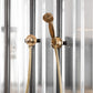Francone BTS23P wall mounted hand shower and separate outlet in traditional unlacquered brass.