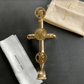 Bespoke Francone BTS3F unlacquered brass bathroom shower and bath faucet with decorative wheel handles.