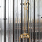 Traditional Francone BTS4 classic adjustable column shower in unlacquered brass with an adjustable hand shower.