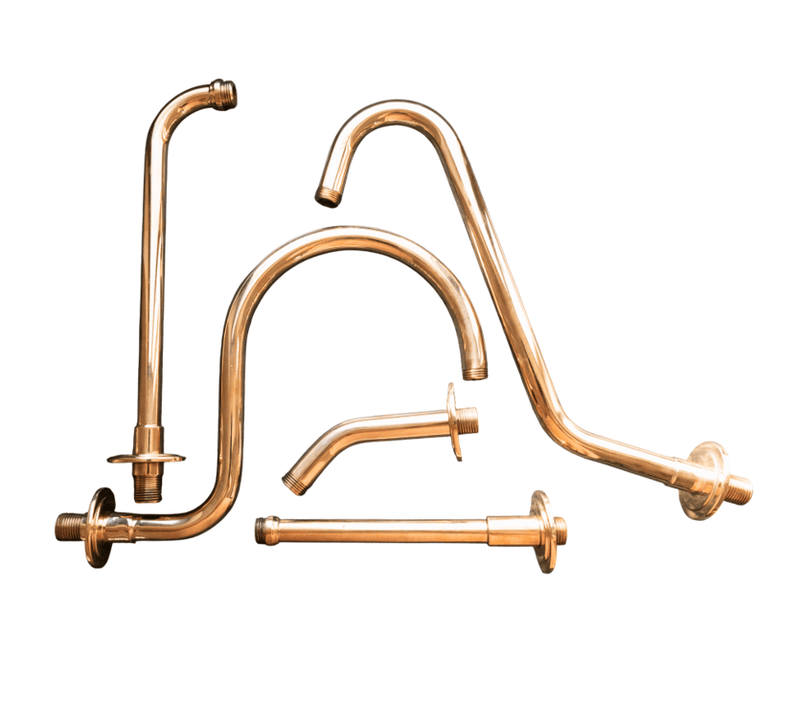 An assortment of Francone BTSA solid brass shower arms in various traditional curved shapes.