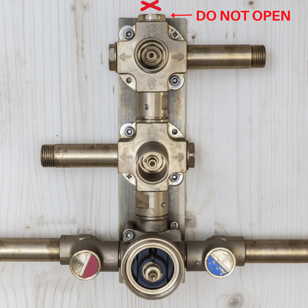 Close-up of the Francone BTST3 solid brass concealed thermostatic shower valve body.