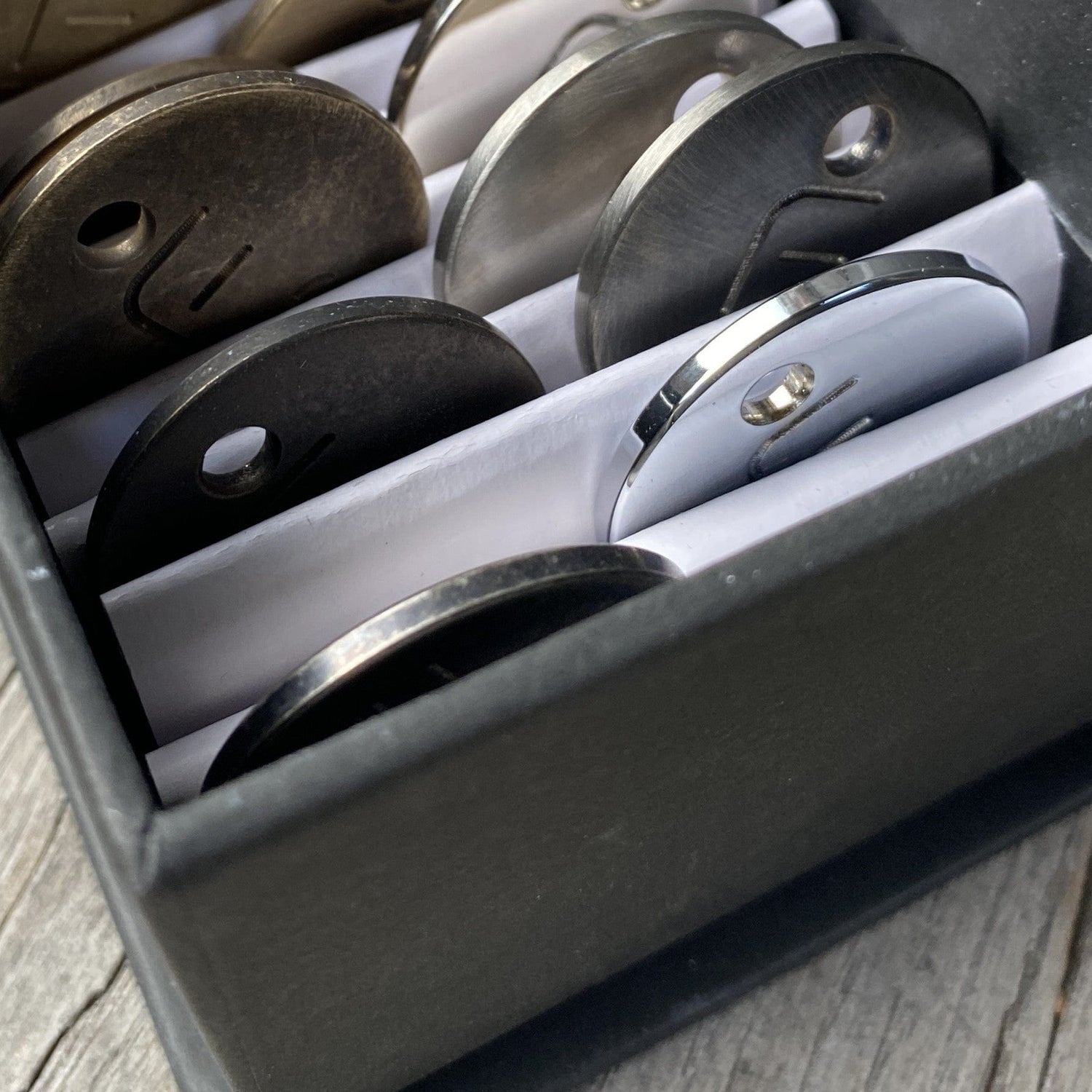 Francone Samples Pack B presenting circular bespoke solid brass finish samples for luxury bathroom fittings.