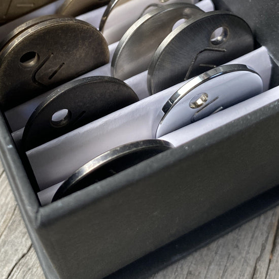Francone Samples Pack B presenting circular bespoke solid brass finish samples for luxury bathroom fittings.
