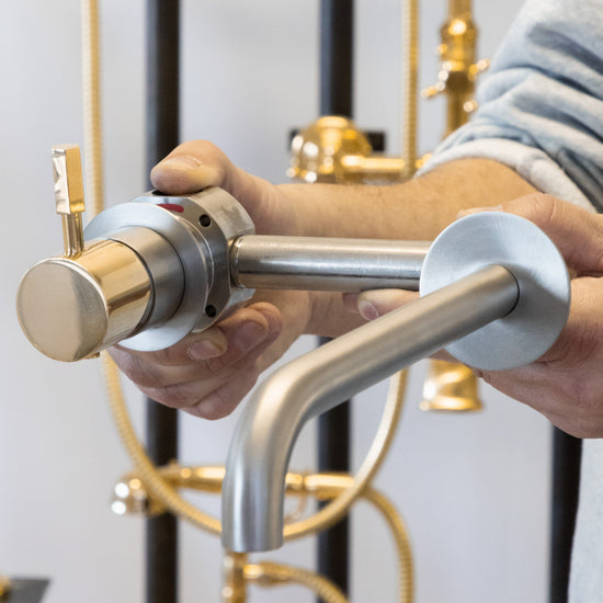 Francone SS42 wall-mounted mixer tap, a bespoke solid brass bathroom faucet.