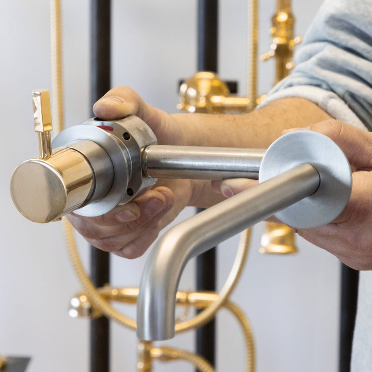 Francone SS42 wall-mounted mixer tap, a bespoke solid brass bathroom faucet.