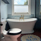 The Francone BT22 traditional unlacquered brass wall mounted bath filler faucet installed in a blue tiled bathroom.