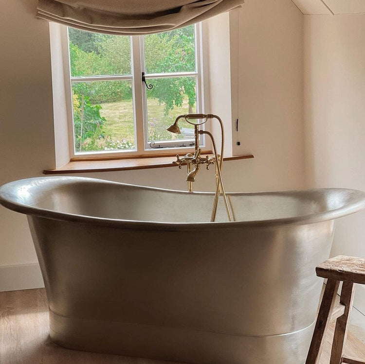 Traditional Francone BT23F solid brass floor-mounted bath filler faucet installed in a bathroom next to a metal tub by Velvet Wellies