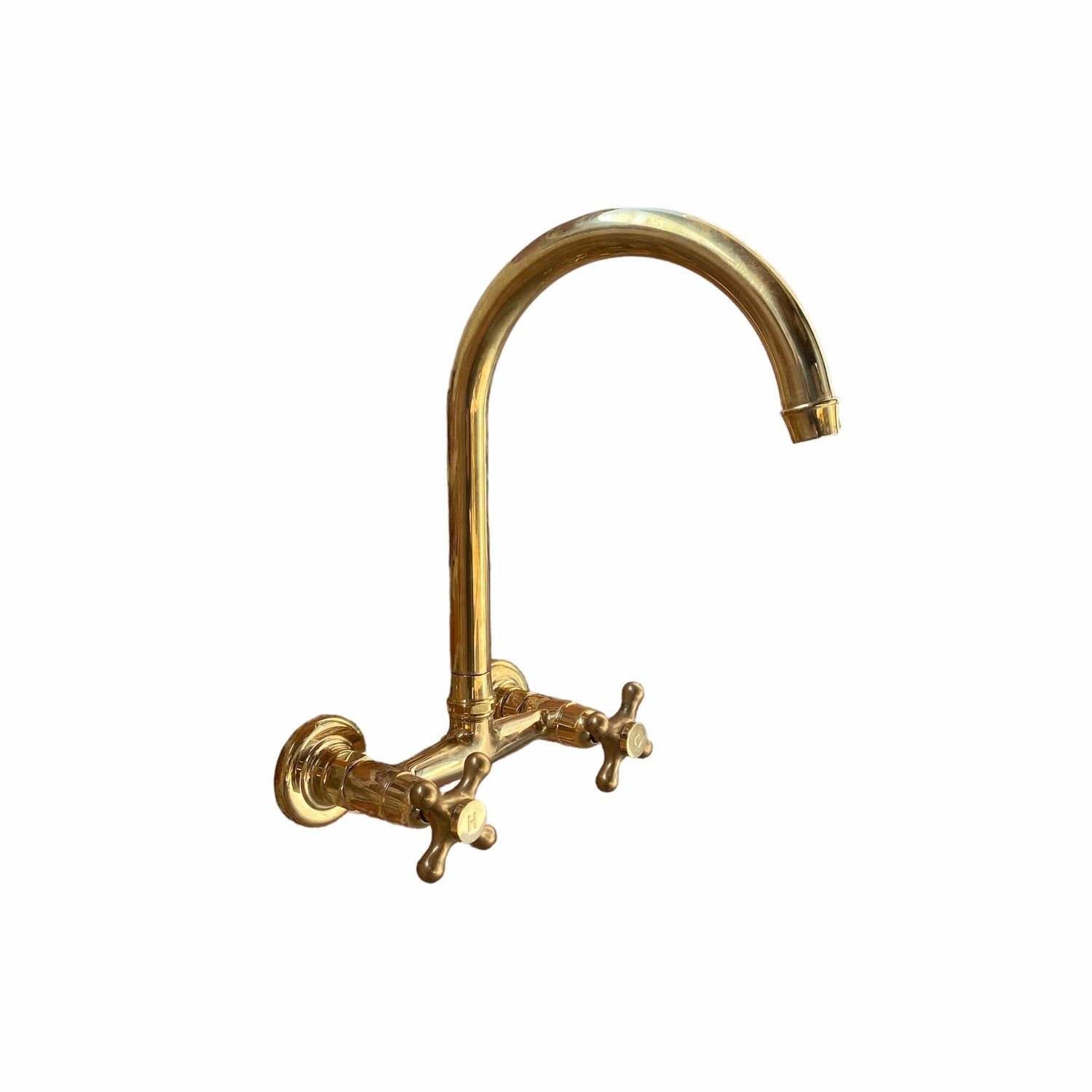 Traditional Francone BT35 unlacquered brass wall-mounted faucet with a swivel spout.