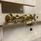 A detail of the traditional Francone BT89F solid brass bath filler faucet with decorative cross handles.