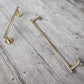 Two sizes of the Francone BTA31 solid brass bathroom towel rail, handcrafted for luxury interiors.