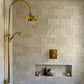 Traditional Francone BTS19 unlacquered brass thermostatic shower column installed in a tiled bathroom by This Bright House.