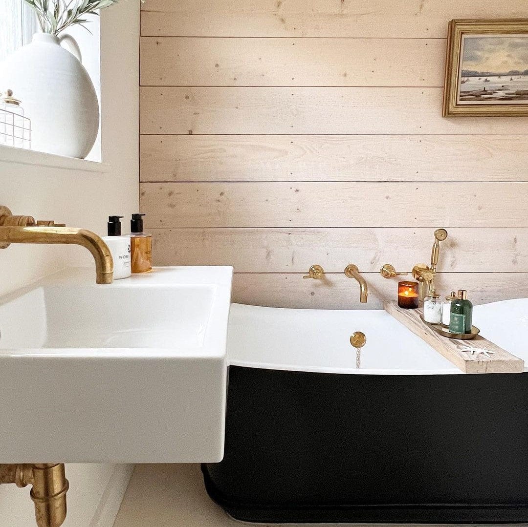 Francone BTS20M unlacquered brass wall-mounted hand shower faucet installed in a rustic bathroom by Simply Scandi Katie