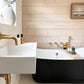 Francone BTS20M unlacquered brass wall-mounted hand shower faucet installed in a rustic bathroom by Simply Scandi Katie