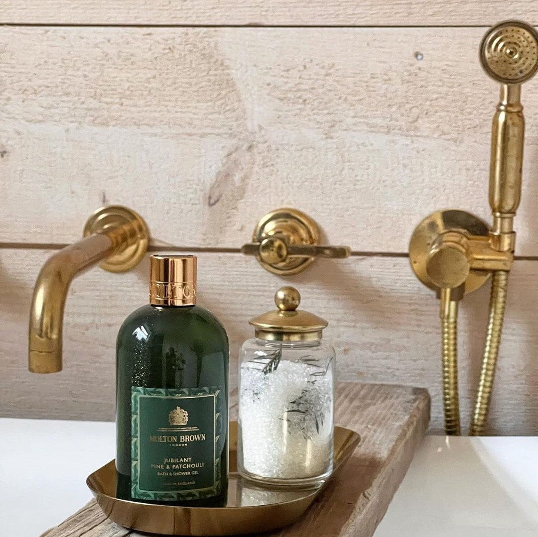 The Francone BTS20M unlacquered brass wall-mounted hand shower and mixer installed in a rustic bathroom by Simply Scandi Katie.